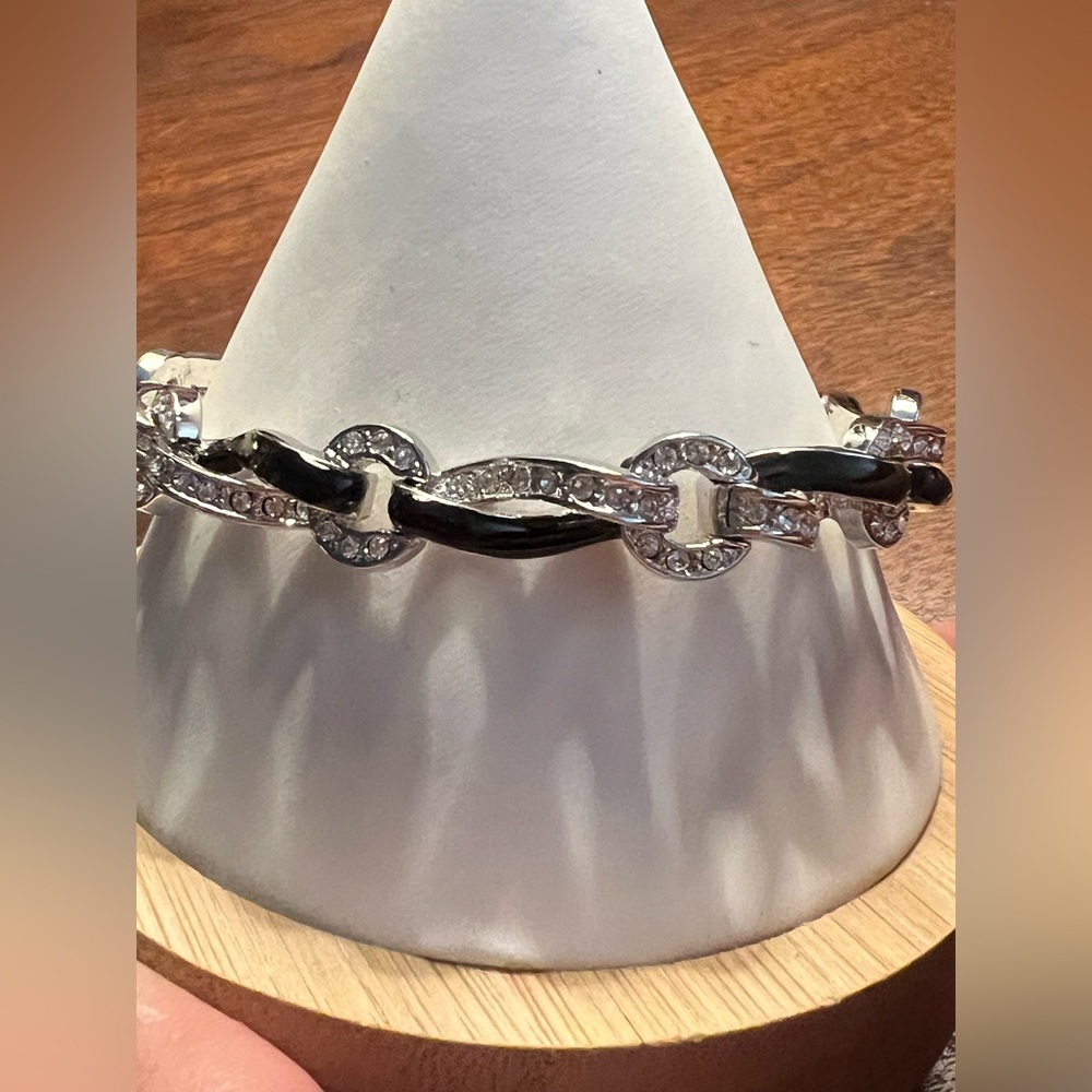 Nolan Miller Silver Tone Black Enamel and Crystal Ribbon Infinity Link Bracelet